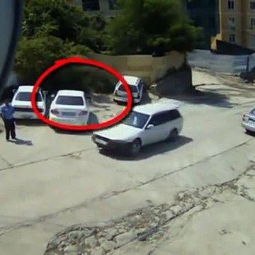 He gets out of car 1 sec before it's crushed by rolling truck