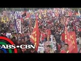 Protesters sing, dance, burn Aquino effigy