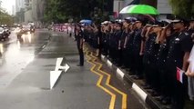 Home team officers saluting during Mr Lee Kuan Yew's funeral procession