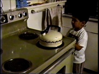 Alex Cleaning the Stove - 19 Sep 92