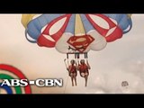 Kris, Erich try parasailing