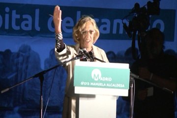 Iglesias y Carmena celebran el triunfo morado