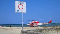 Atterraggio d'emergenza elicottero in spiaggia