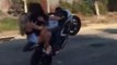 Boy doing stunts on Heavy Bike with his Girl Friends