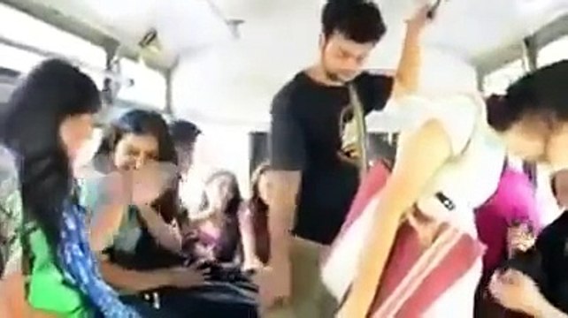 Girl slap to a innocent boy and Then Boy slap to a Girl in a bus