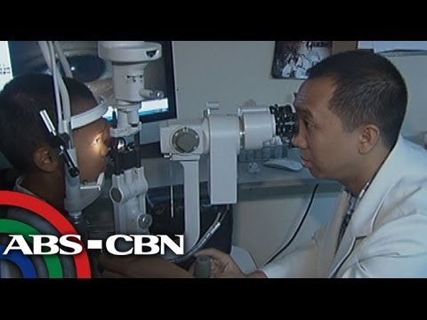 On going eye operation of a boy with tumor