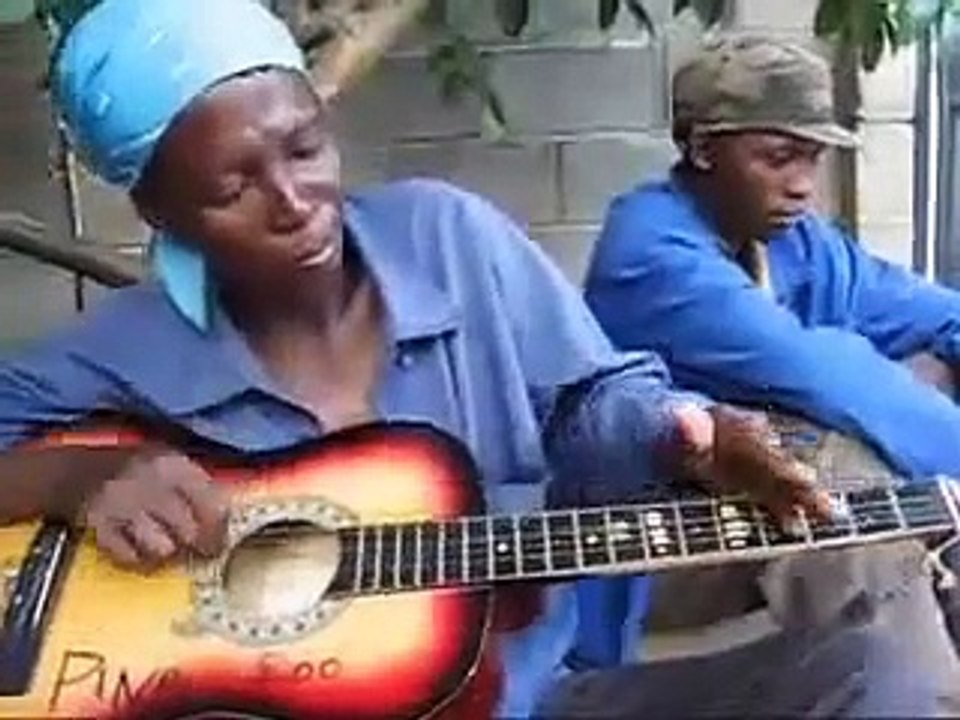 True Talent: West African Woman Playing The Guitar!
