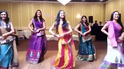 bride friends dance on her wedding