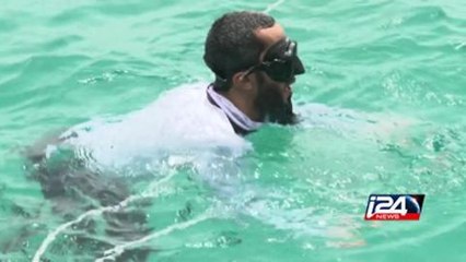 القطريون يحيون تراث صيد اللؤلؤ بمسابقة للغوص