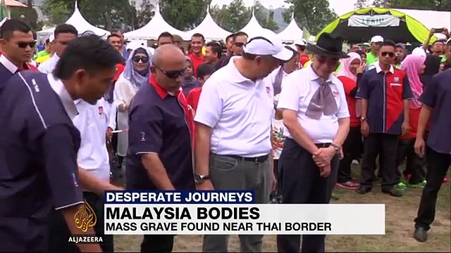 Mass graves of suspected migrants found in Malaysia