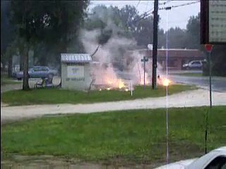 Power lines on fire after lightning hit tree
