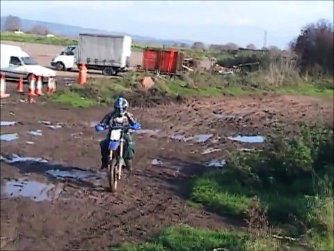 Motocross kids having fun in the mud