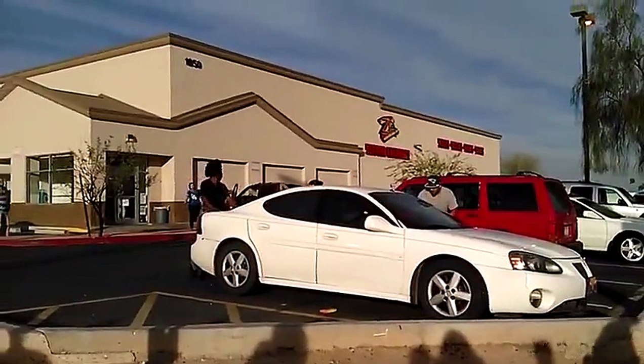 Crazy ROAD RAGE - Guy hangs on to car and almost gets killed