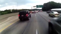 Dumb motorcyclist crashes while overtaking cars and lane splitting