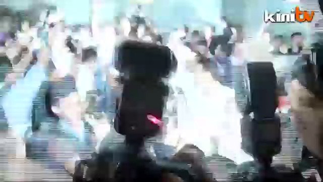 Anwar walks free... for now