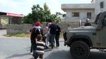 Israeli soldiers throw stun grenades at Palestinian children