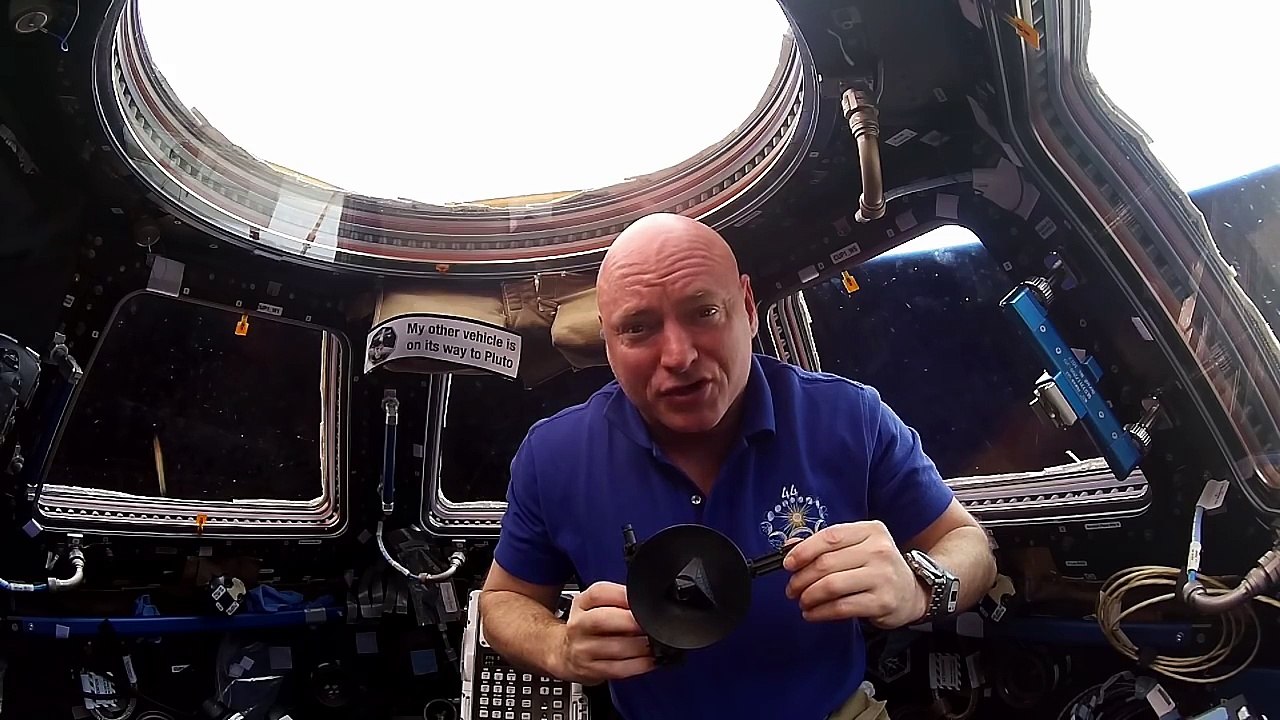 Scott Kelly Recognizes Pluto Flyby from the Space Station with a ISS made 3D printed New Horizons Model
