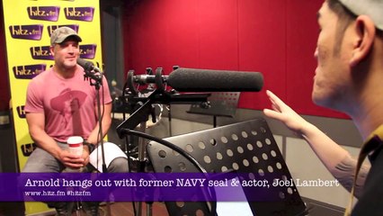 Arnold hangs out with Joel Lambert