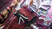 Packing carpets in Afghan shop, Shopping in Mazar e Sharif, Afghanistan