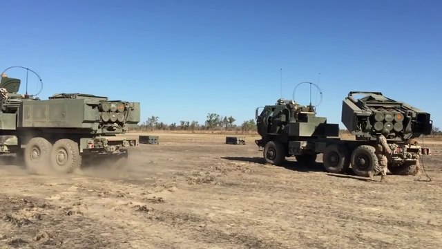 US Marines Firing the Extremely Powerful Multiple Rocket Launcher 142 HIMARS