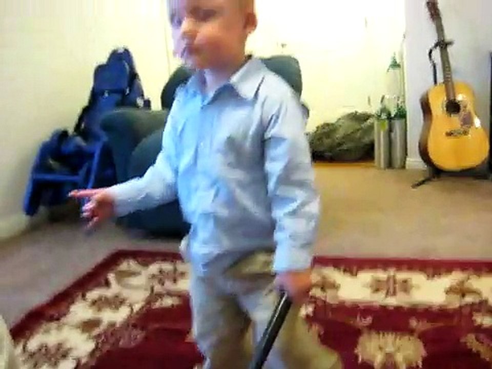 Tyson, my blind son and his new cane.