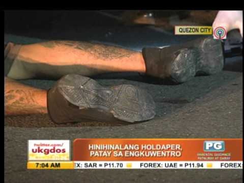 Suspected robber shot dead in QC