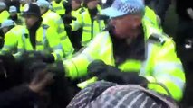 EXTENDED FOOTAGE - riot police officer U1202 punches student in head at london protest