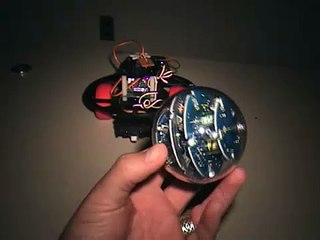 Robot Finds and "Kicks" IR Soccer Ball