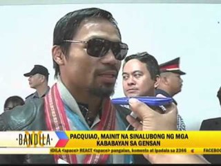 Victorious Pacquiao returns home