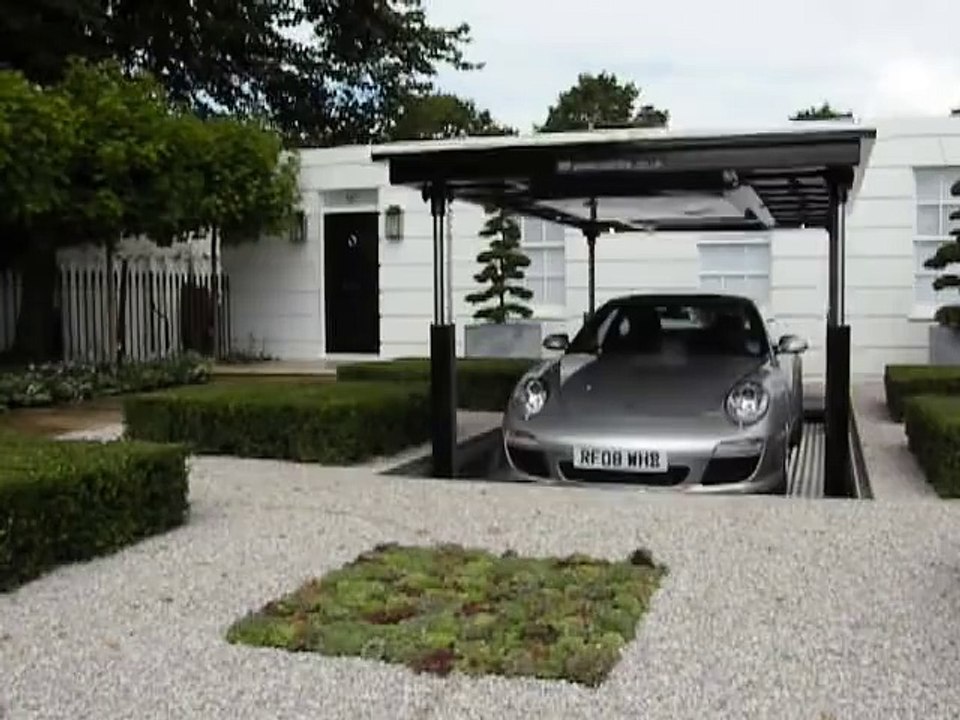 Amazing hidden car garage.