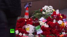 Flowers, tears at Nemtsov murder scene opposite Moscow Kremlin