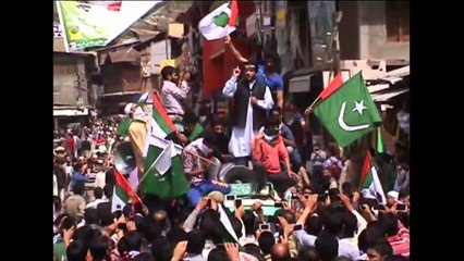 Pakistan flags flown at a rally held by Kashmiri separatist leader Shabir Ahmad Shah