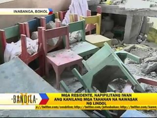 Earth swallows houses in Bohol village