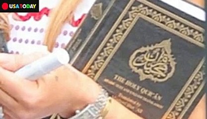 Lindsay Lohan carries the Quran as she steps out in Brooklyn
