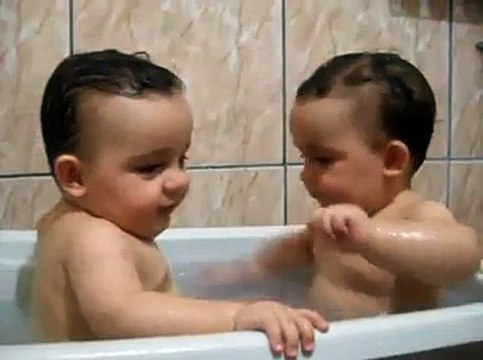 Twins Brothers Enjoying Bath Time