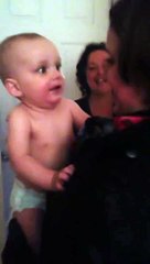 A baby meets the twin sister of her mother