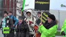 Germany: Fake Merkels topple coal stations and burn coal outside Chancellery