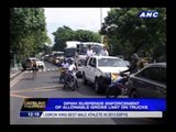 Truckers rally in front of DPWH, cause heavy traffic