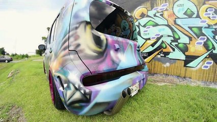 Fitted Bagged and Grafitti Tagged Nissan Cube in New Orleans