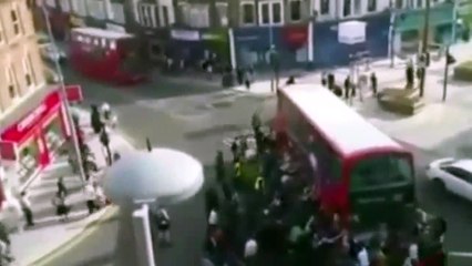 WATCH Incredible Moment A Crowd Lifts Double Decker Bus Off Trapped Unicyclist (VIDEO) RAW