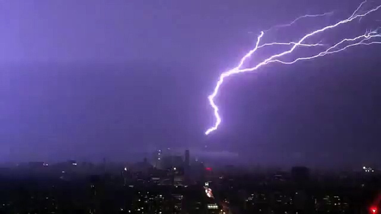 Intense thunder and lightning storm strikes CN Tower, Toronto, Canada.  August 24, 2011.