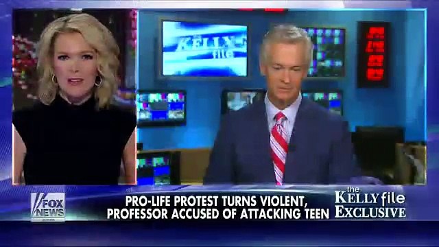 Feminist Bigfoot caught on video assaulting pro-life females, stealing & destroying sign