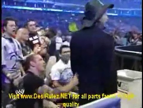 Chris Jericho calls Mickey Rourke out and gets knocked out.