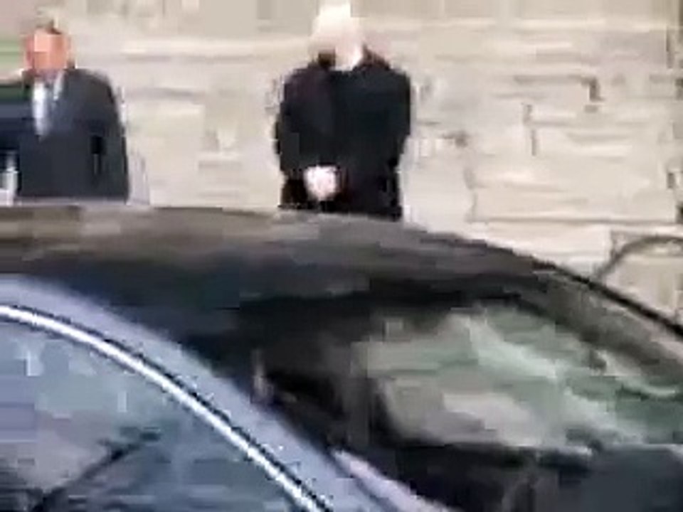 Silvio Berlusconi takes traffic cop from behind