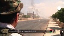 Libyan fighters fire mortars against pro-Gaddafi positions in Sirte - no comment