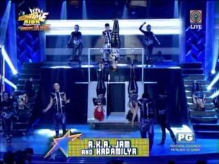 A.K.A Jam sings while hanging upside down
