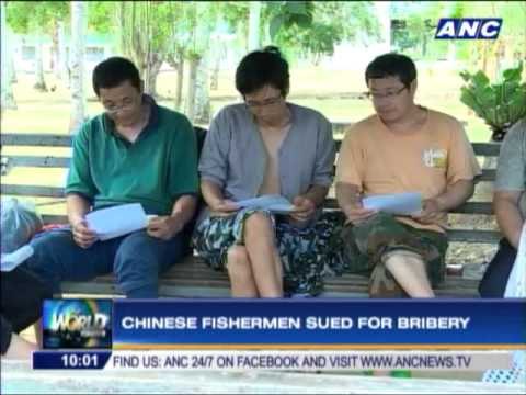 Chinese 'poachers' also charged with bribery