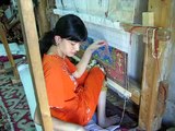 making hand made silk carpets