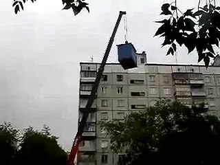 Crane Drops Insecure Load with Fully Extended Boom
