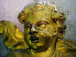 Dorure sur bronze: restauration et patine